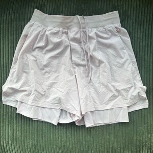 EUC lululemon athletica light pink lined vented tennis shorts